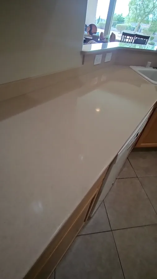 Corian solid-surface countertop with an integrated sink after refinishing