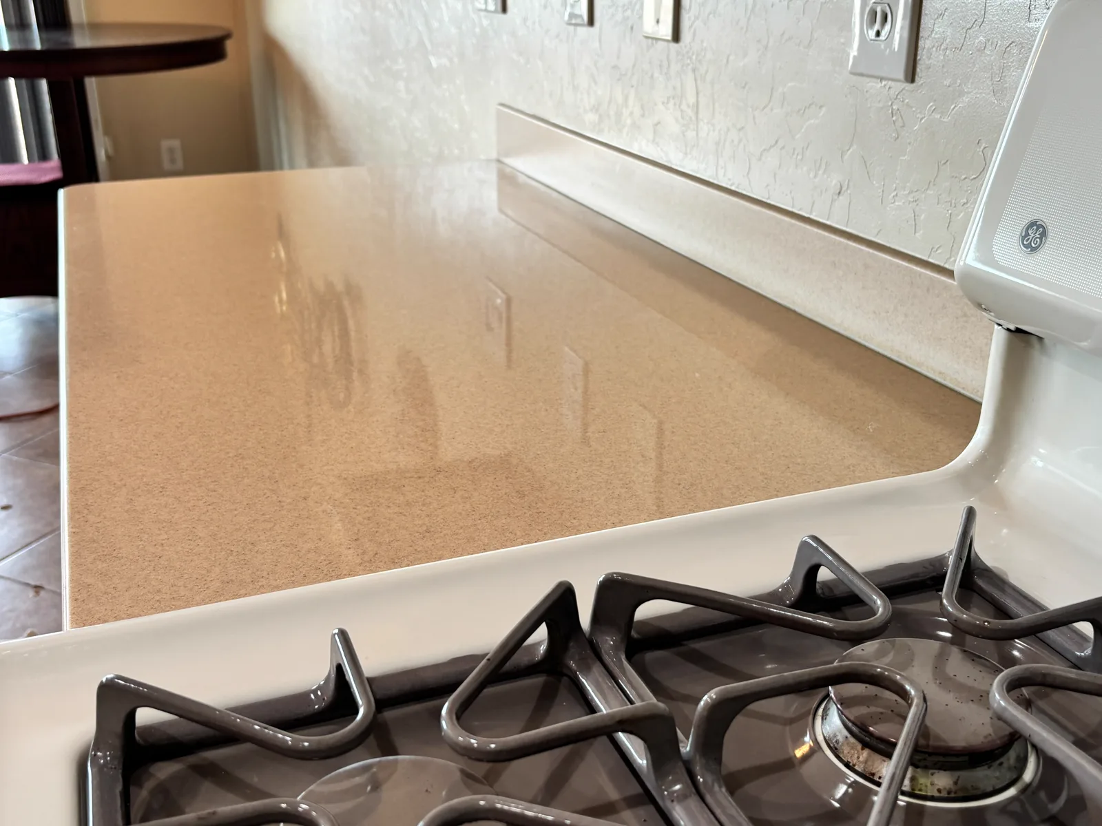 Corian solid-surface countertop with an even finish after refinishing