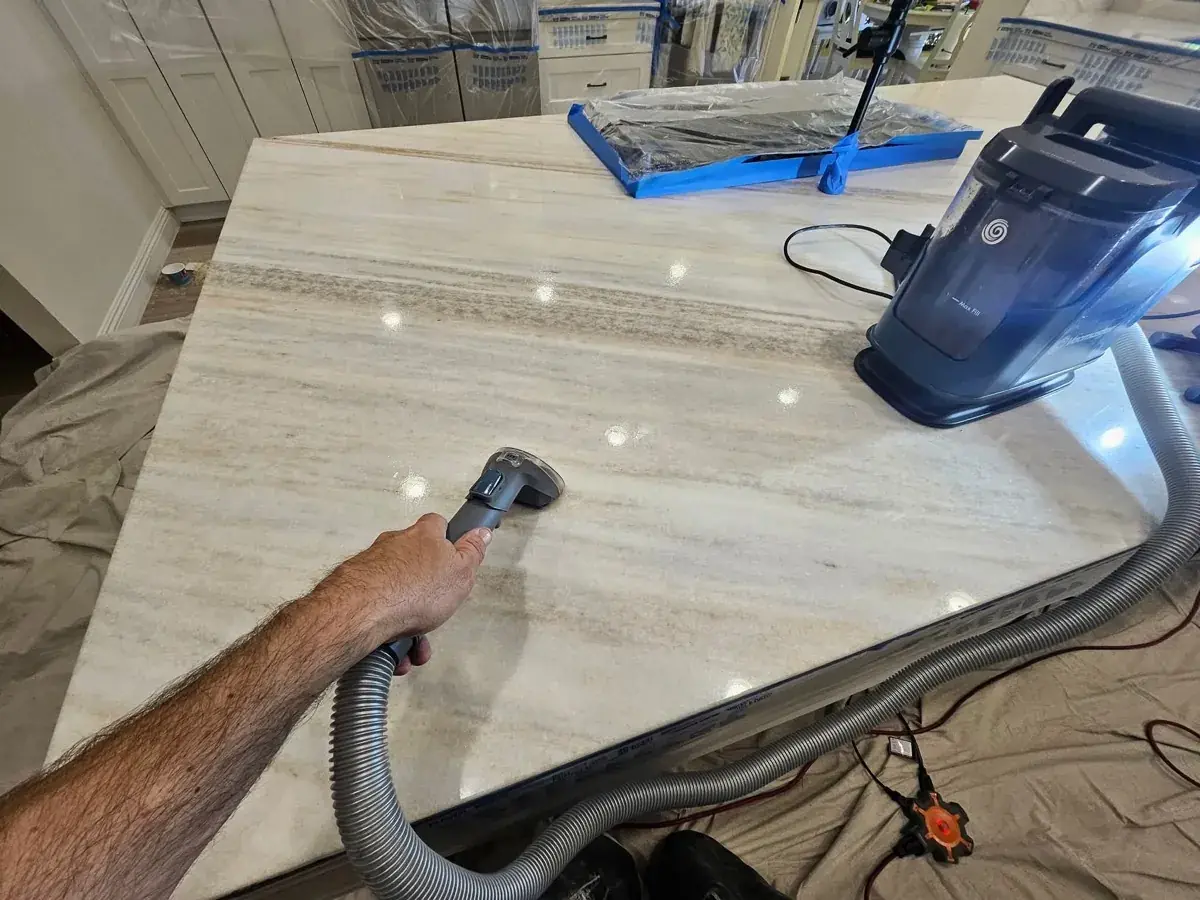 Professional marble countertop polishing in progress