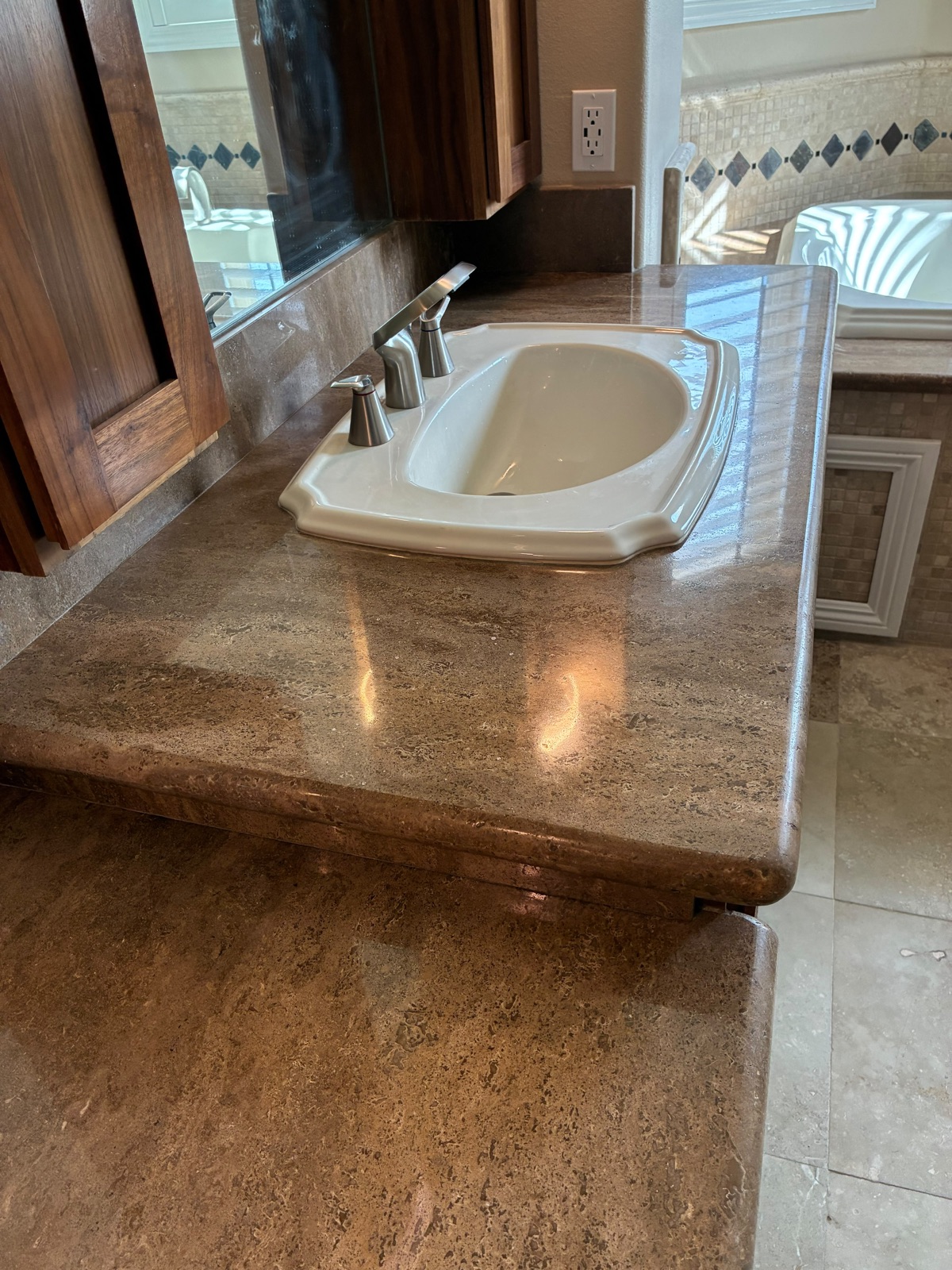 Marble vanity countertop after professional cleaning and polishing