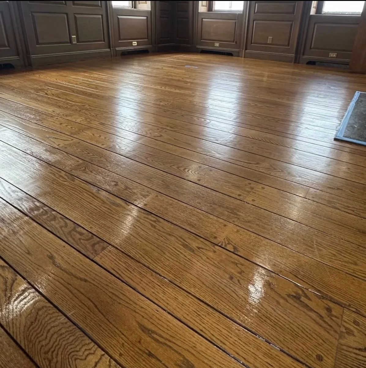 Close view of an existing hardwood floor with its original character preserved