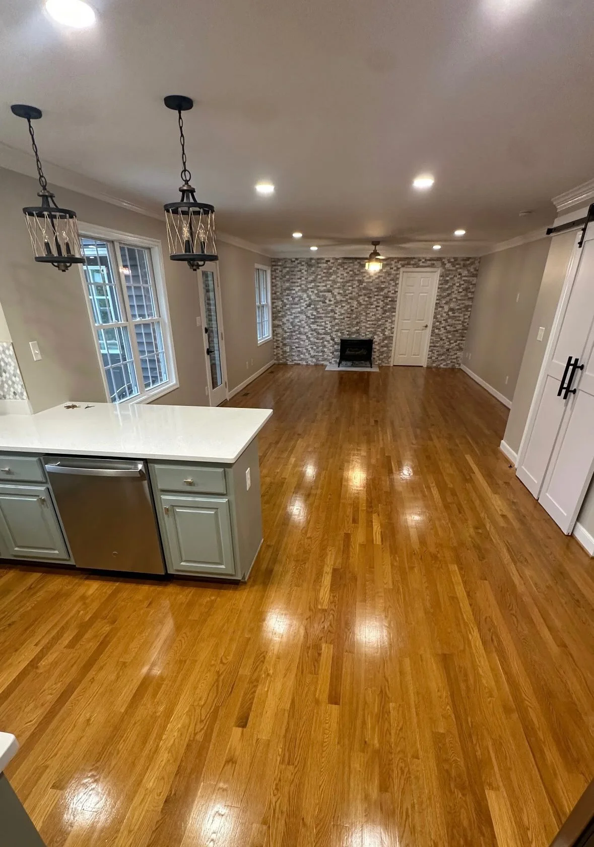 Finished residential hardwood floor after professional surface care