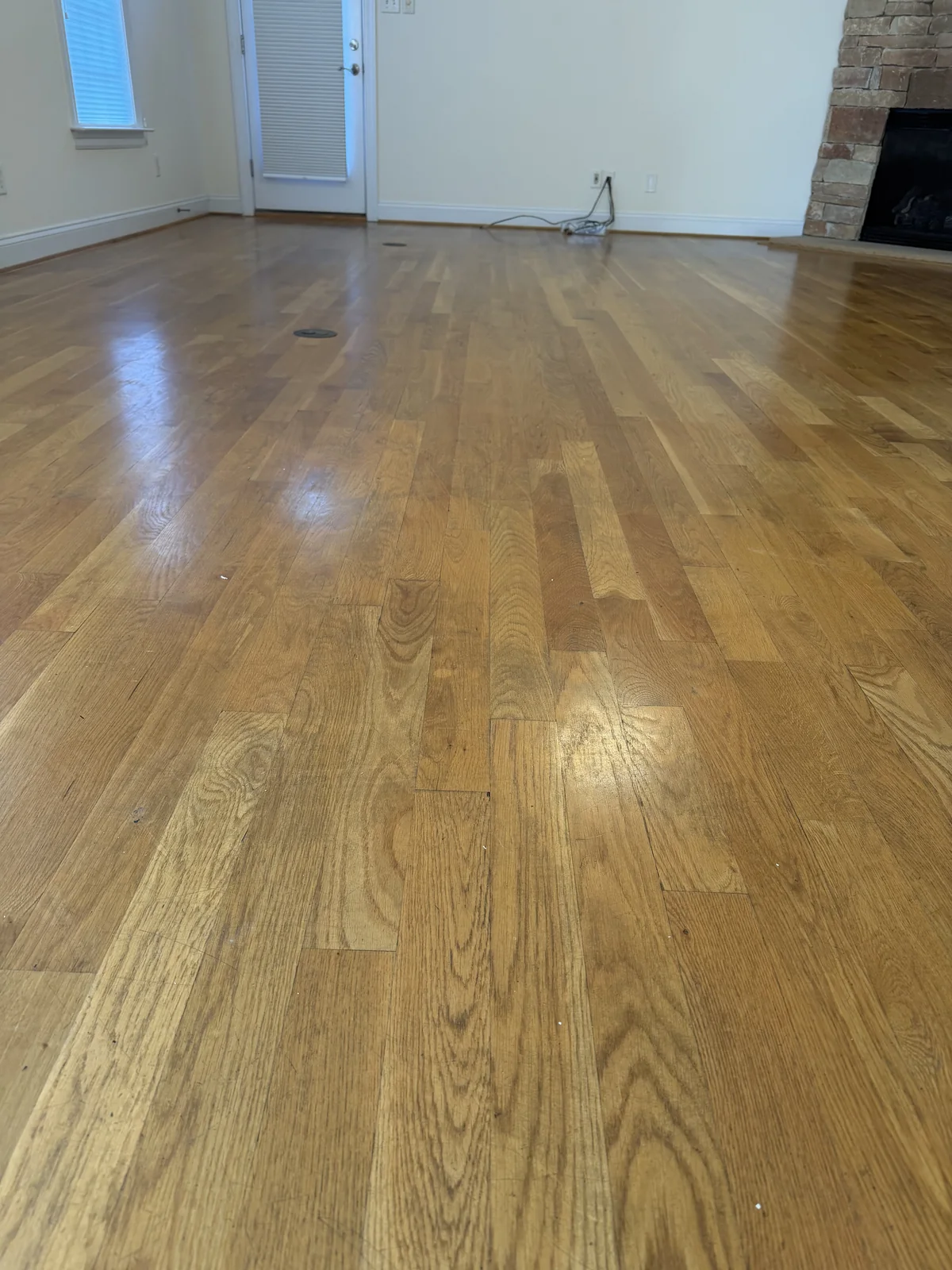 Before: oak floor with an amber cast and blotchy shine from years of Mop & Glo buildup