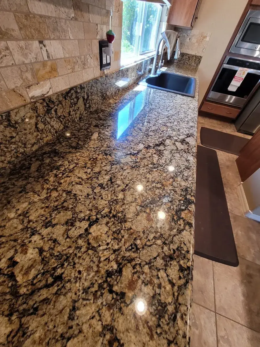 Polishing equipment positioned on a granite countertop