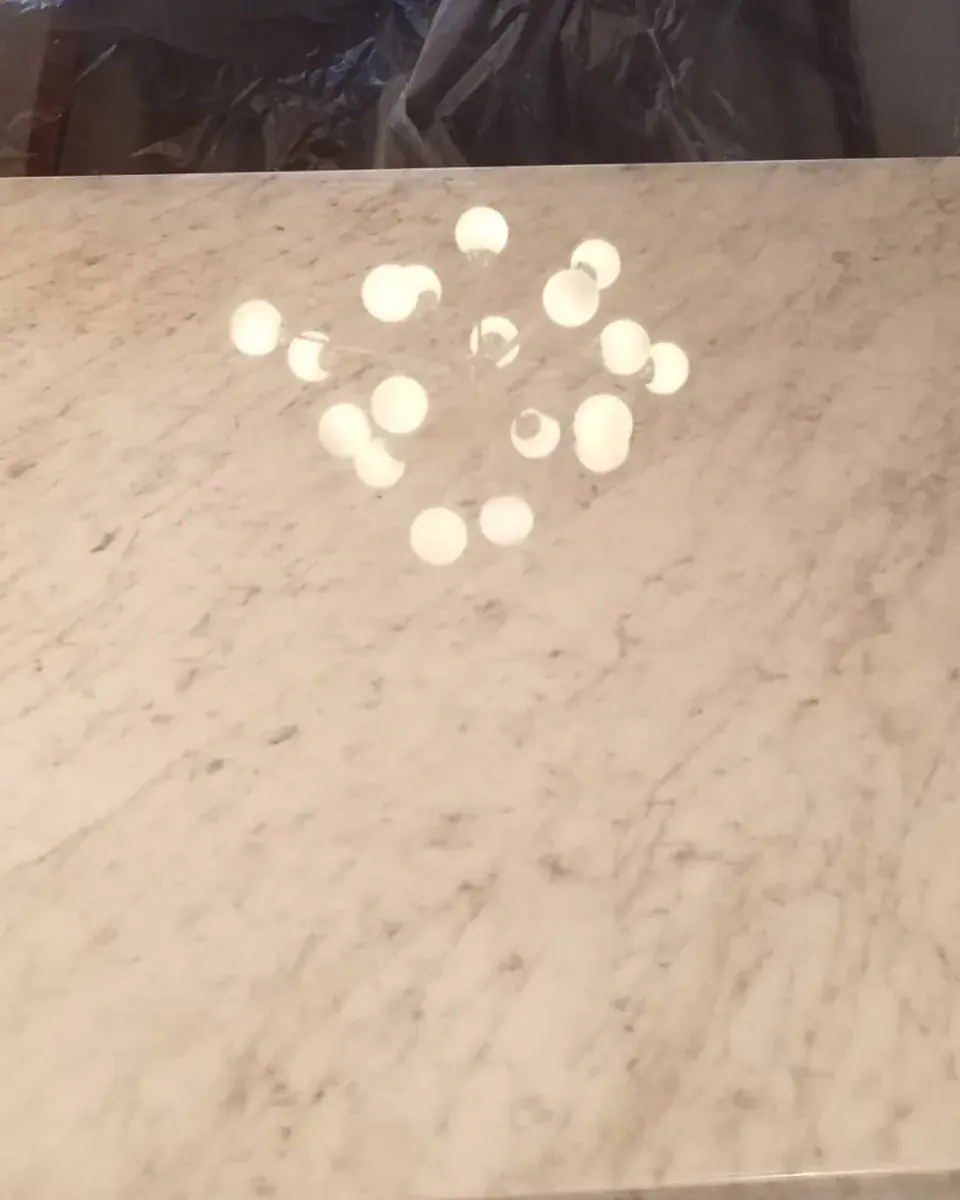Marble surface with a clear reflected finish