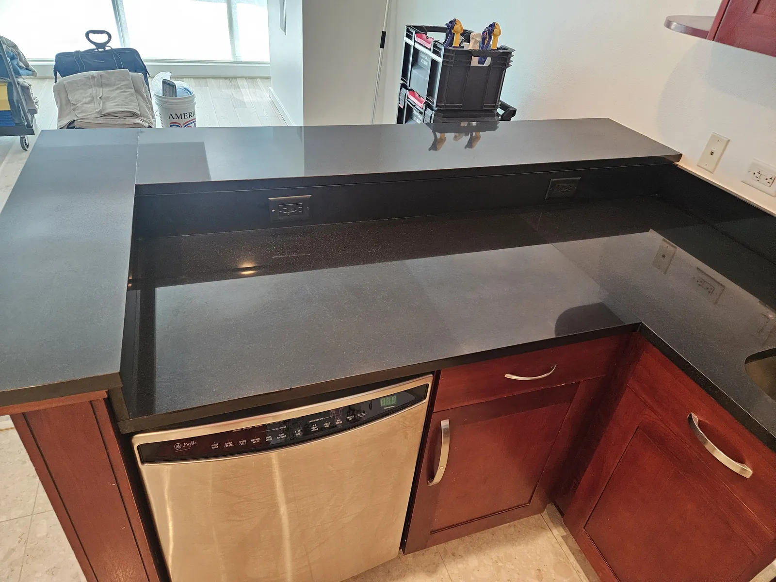 Black granite kitchen countertop with a smooth polished finish