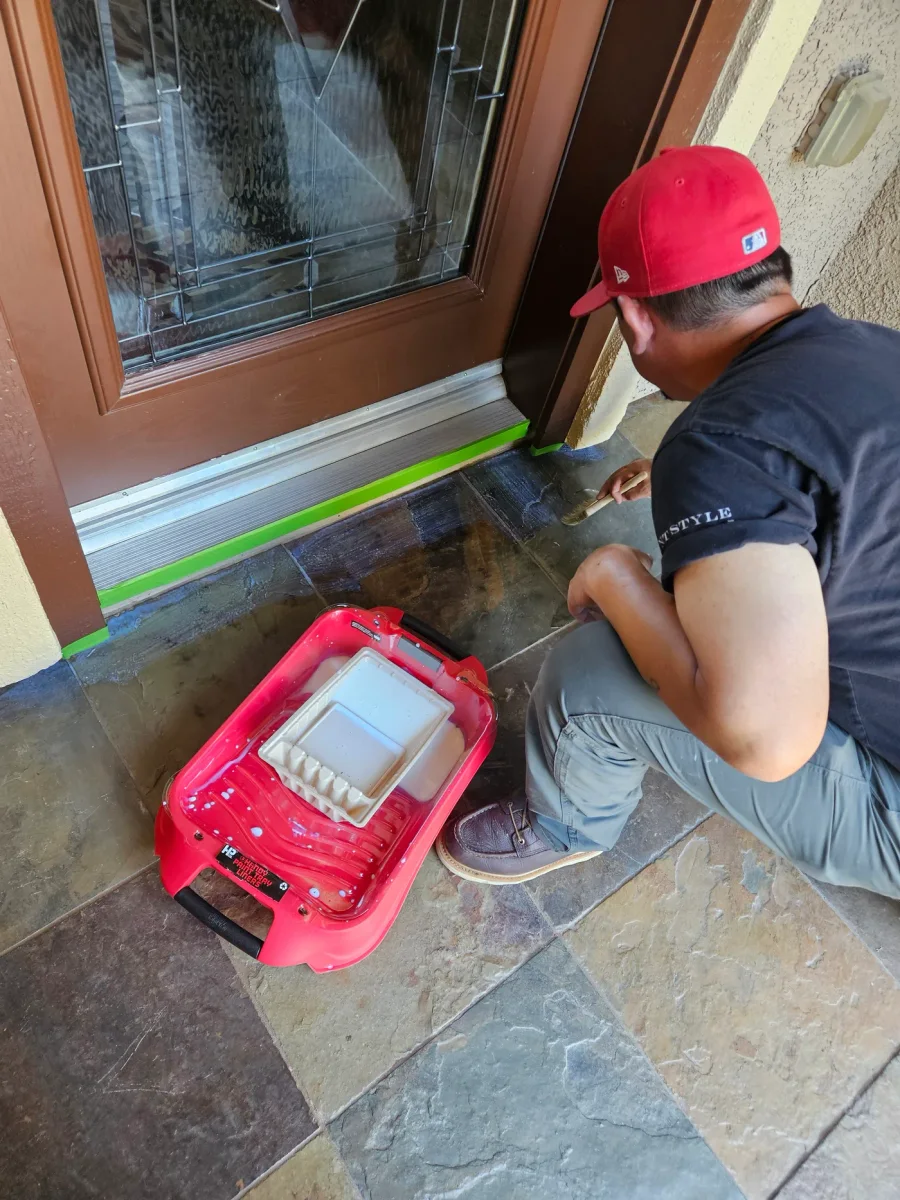 Detailed sealer application along the edge of the restored surface